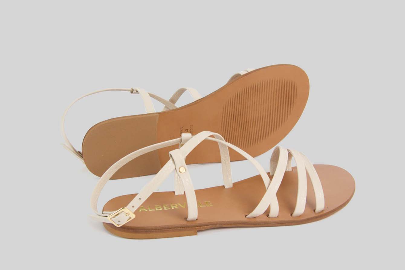 Beige sandal with thin straps.