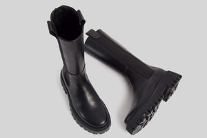 High boots with elastic and zip back.