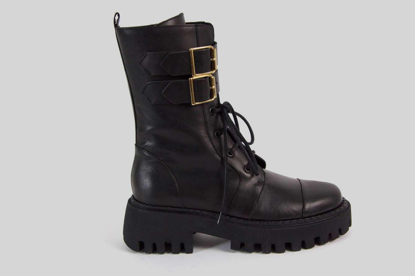 Lace-Up boots with golden buckles.